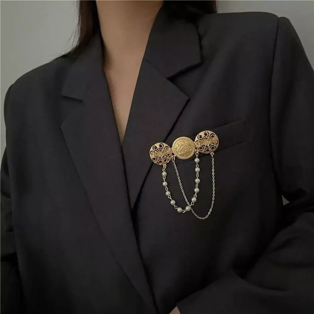 neat gold brooches