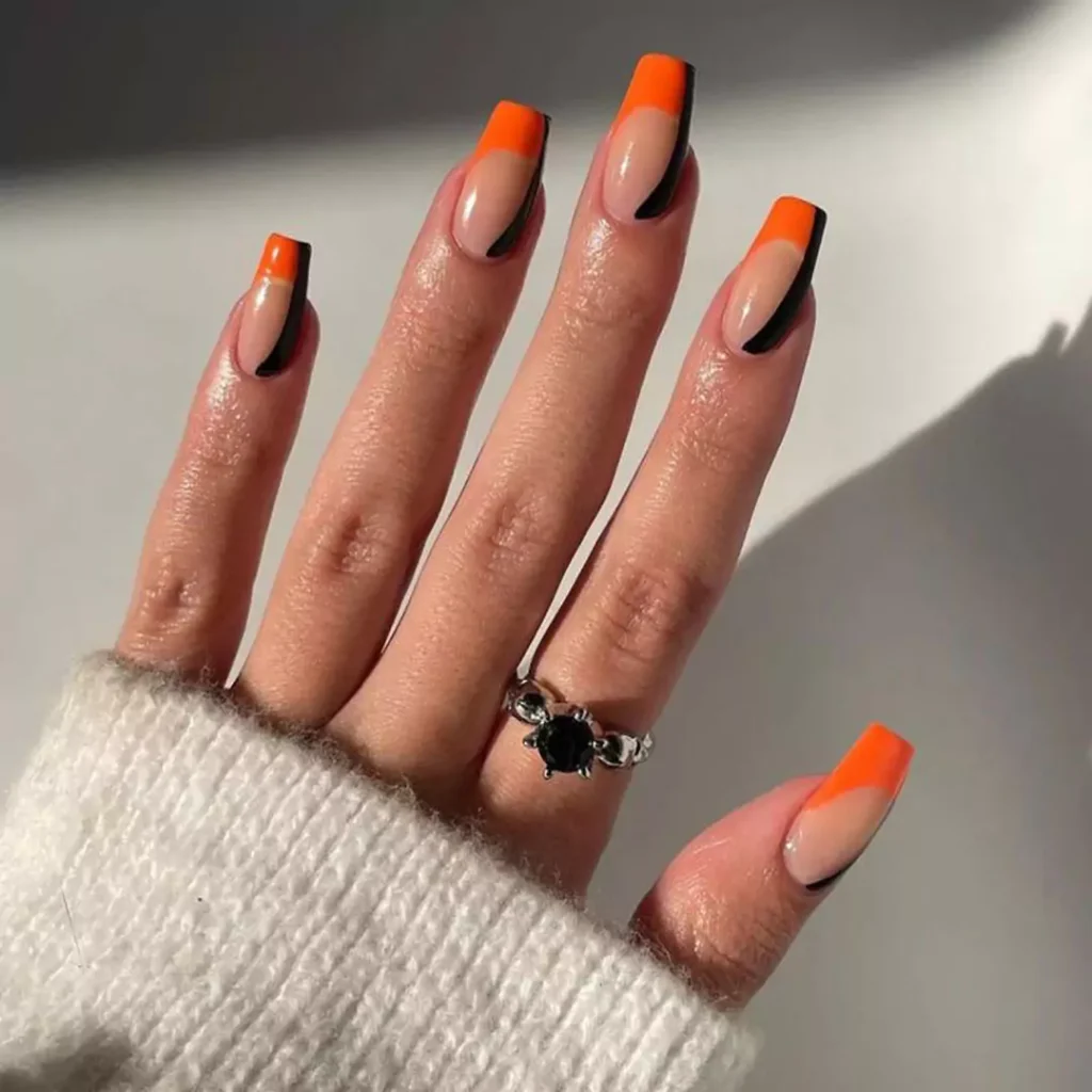 Stylish and special Black and orange nail designs