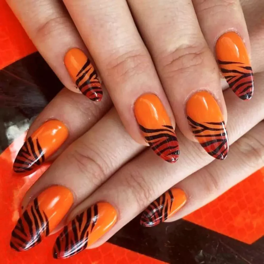 Attractive and special Black and orange nail designs