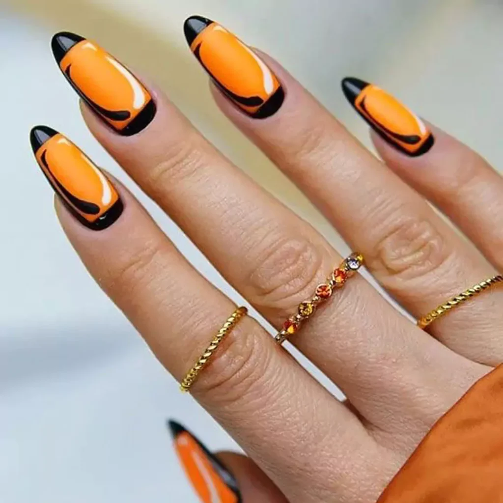 Beautiful and charming Black and orange nail designs