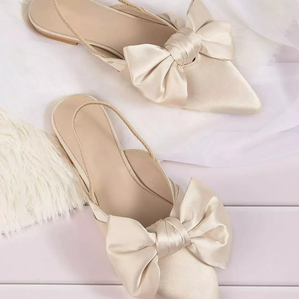 bow-adorned bridal flat shoes