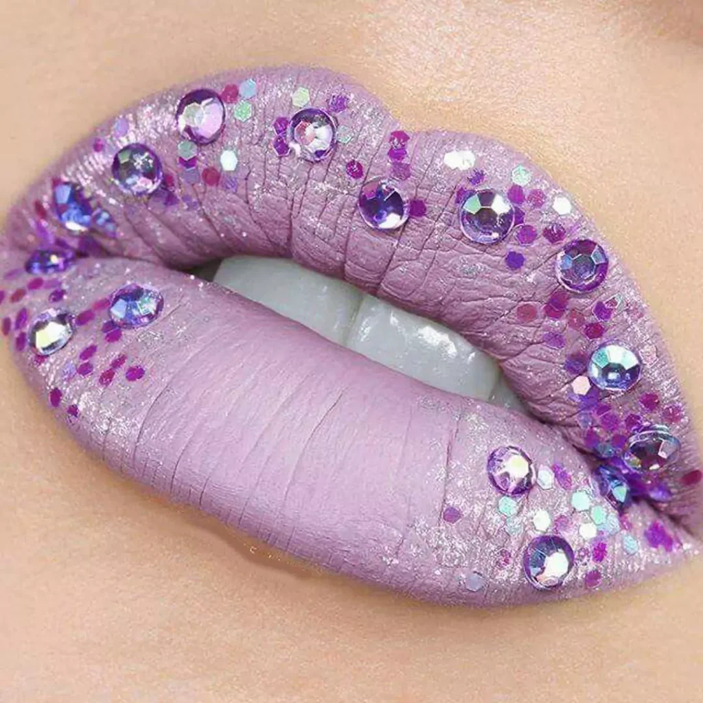 purple lip makeup with jeweled designs