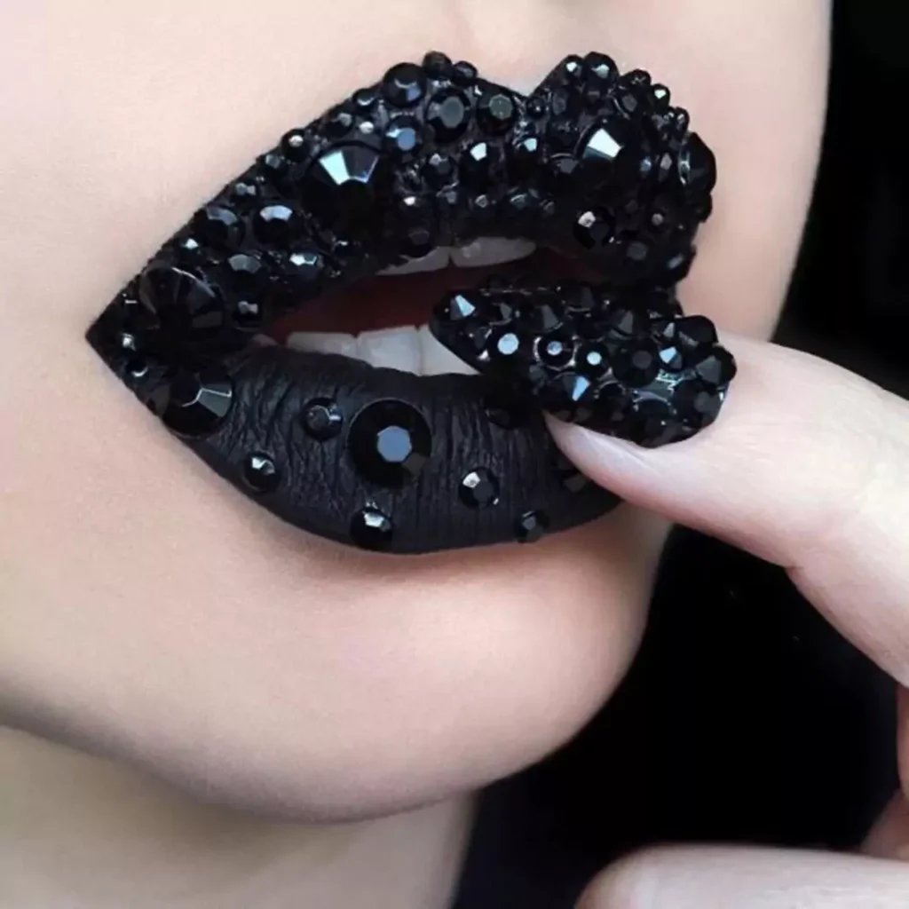 black lip makeup with jeweled designs