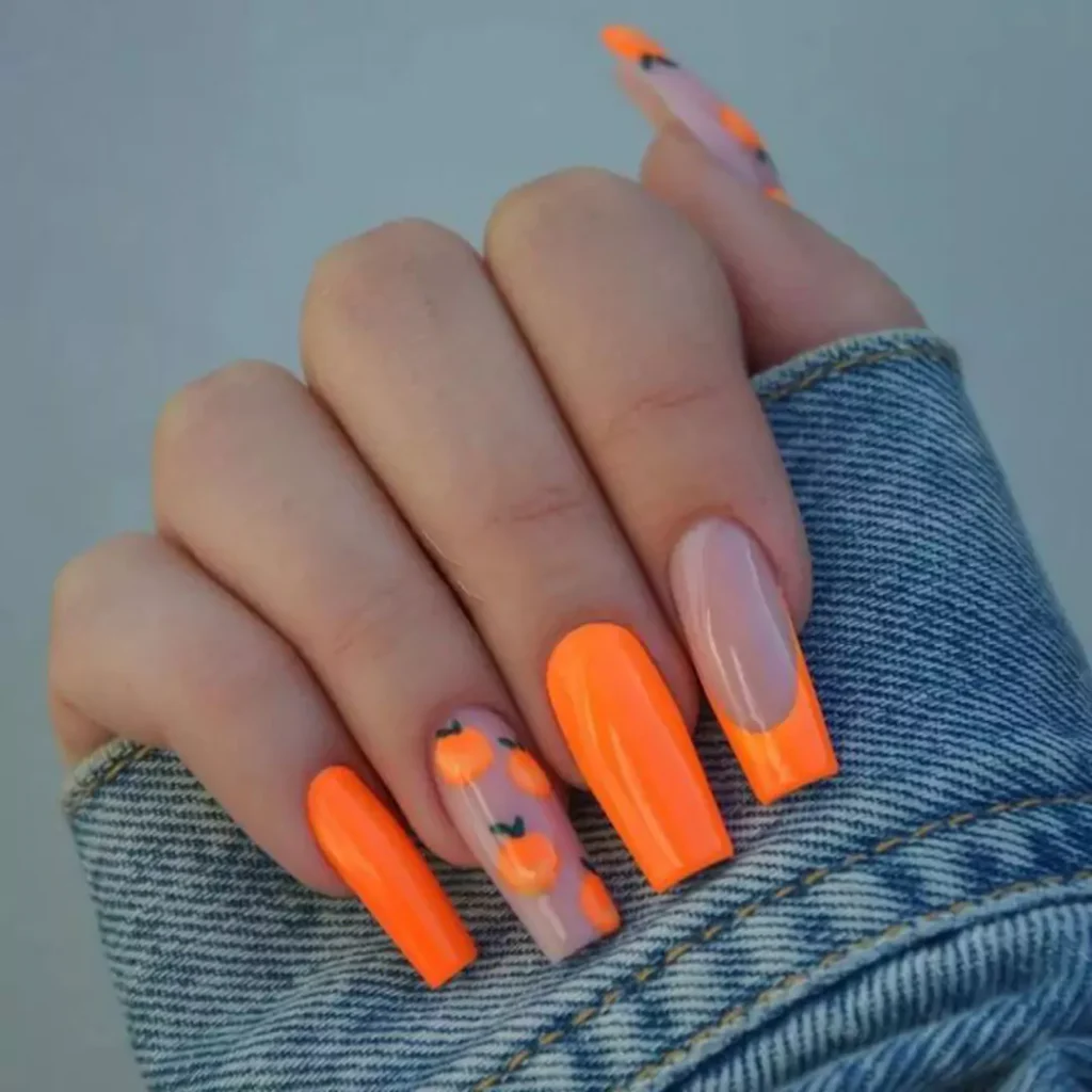 dazzling nail designs with an orange theme 