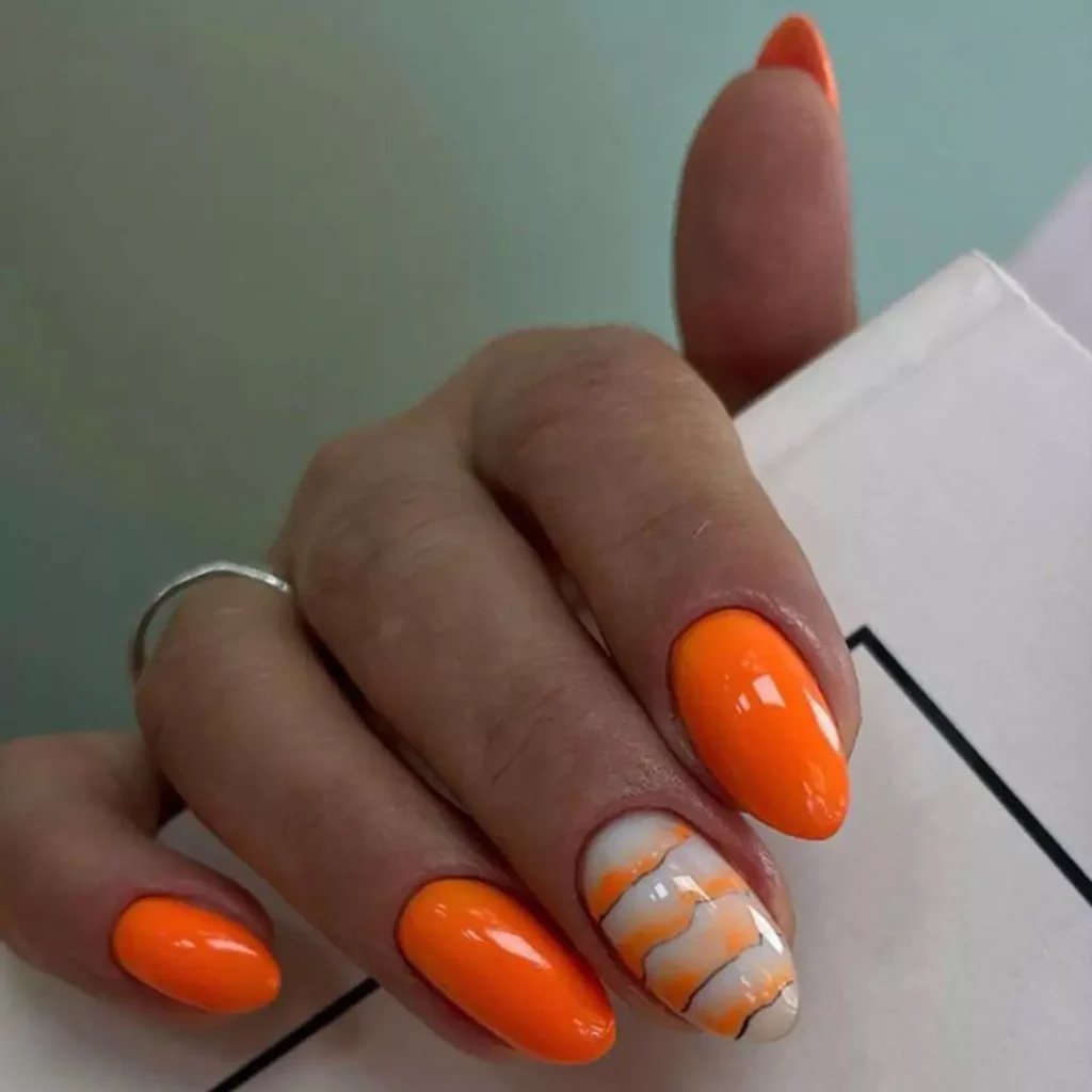 glamorous nail designs with an orange theme 