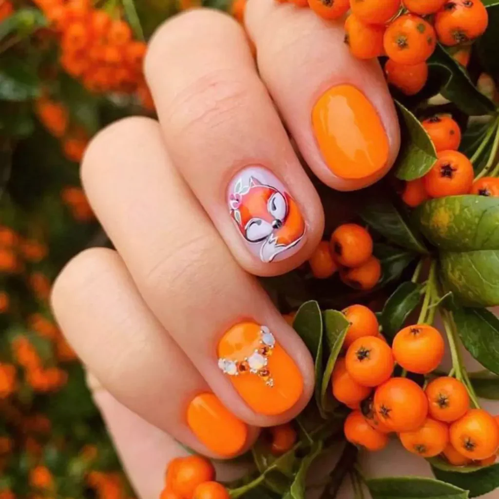 trendy nail designs with an orange theme 