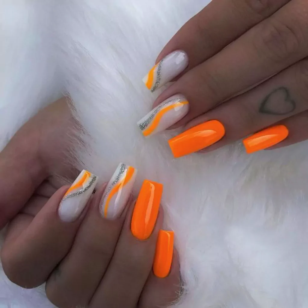 exquisite nail designs with an orange theme 