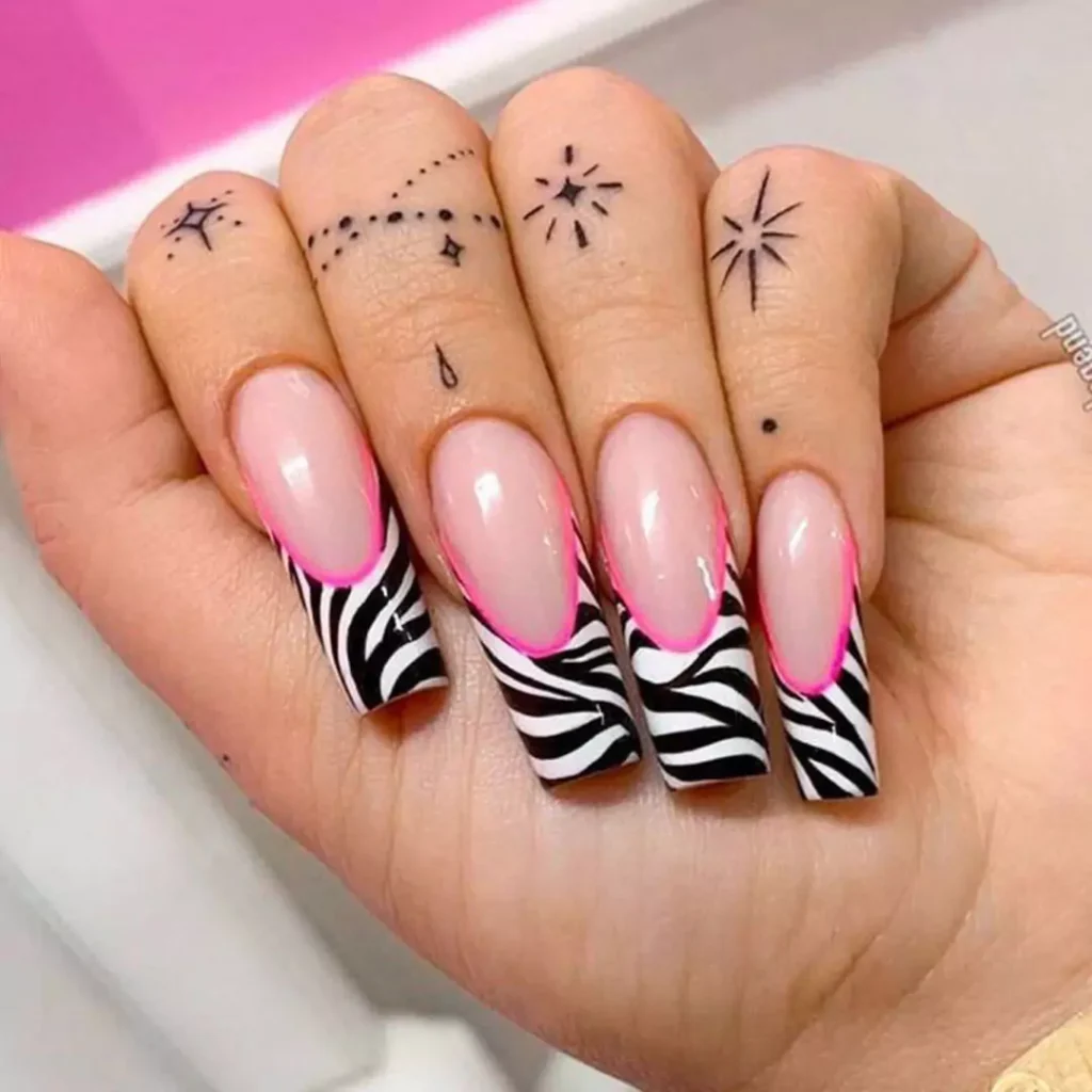 vibrant nail designs with a zebra theme 