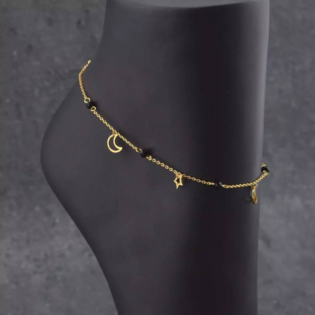 delicate gold moon and star anklets 