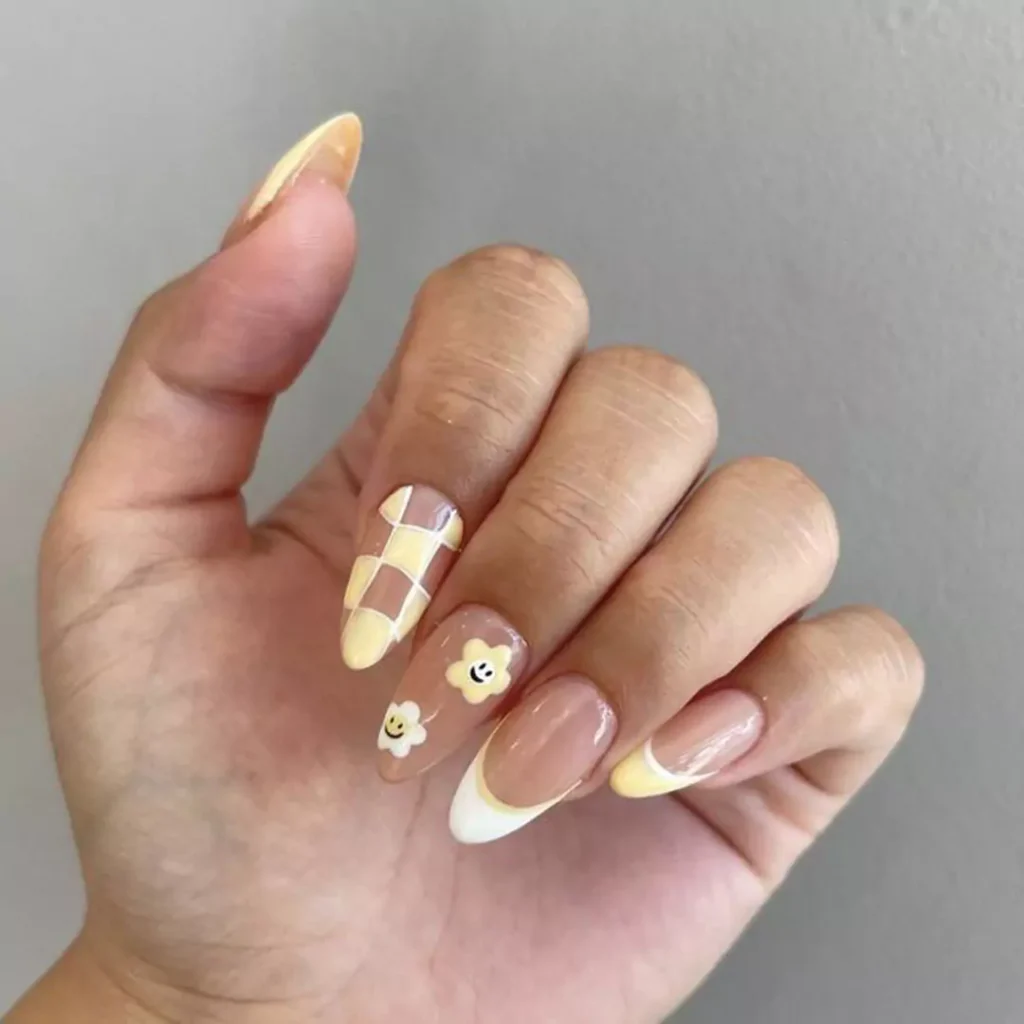 sophisticated yellow and white theme nail designs 