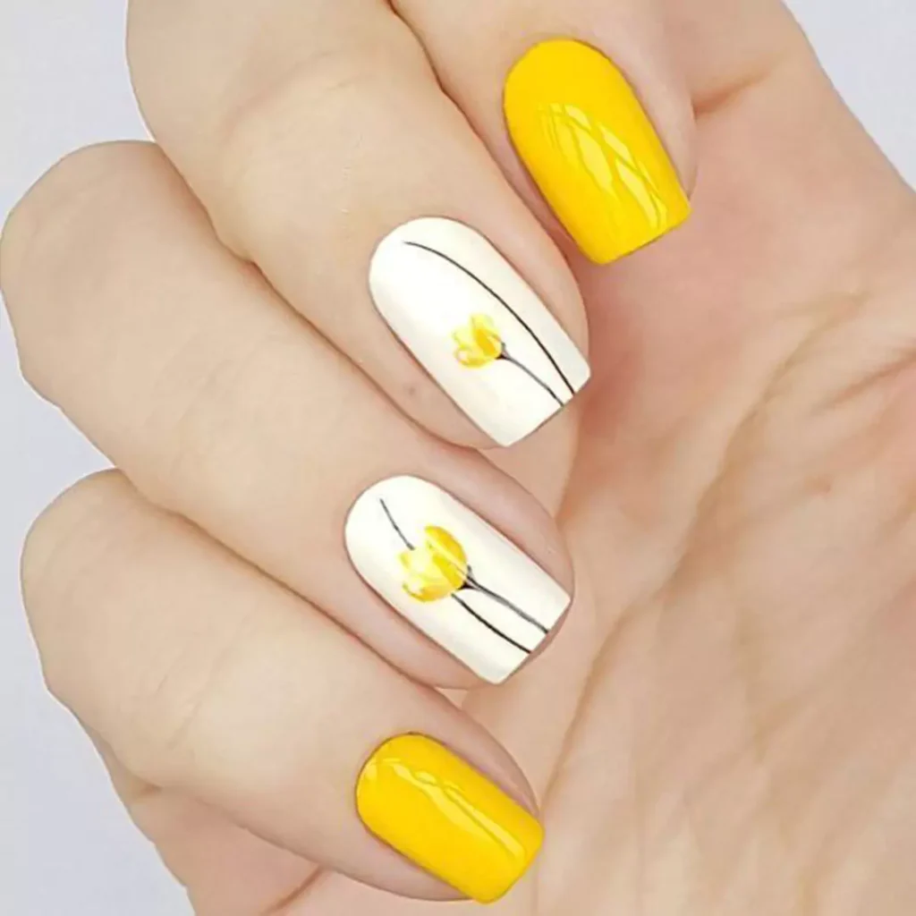 glamorous yellow and white theme nail designs 