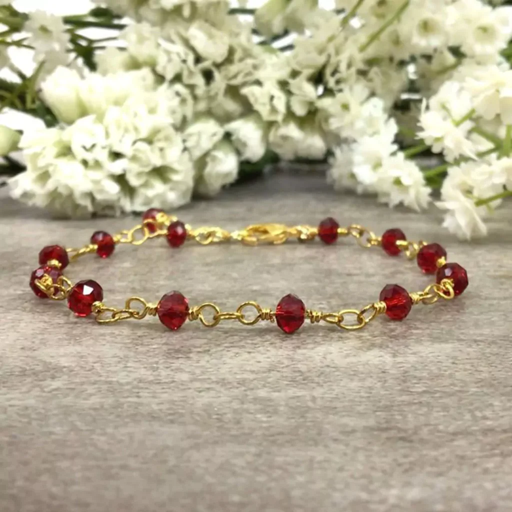 splendid gold bracelets with ruby gemstones