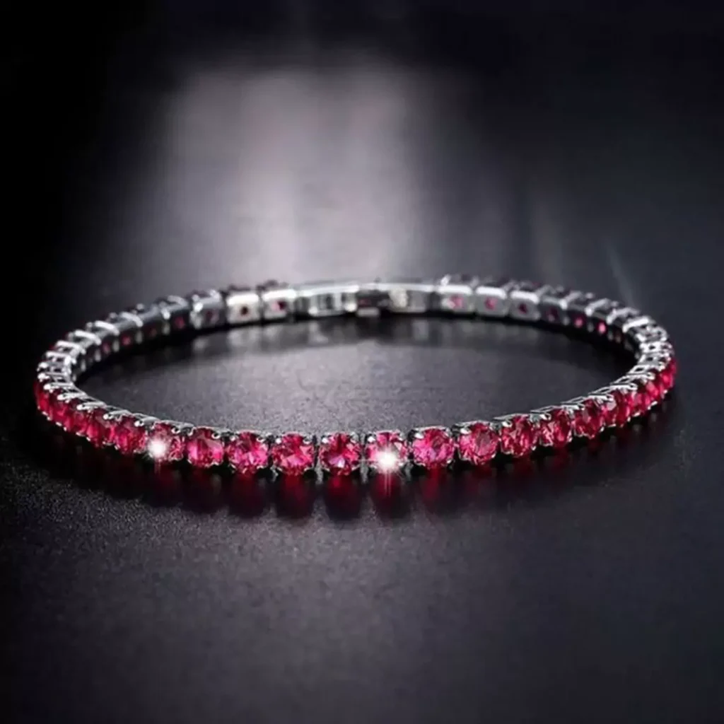 delicate gold bracelets with ruby gemstones