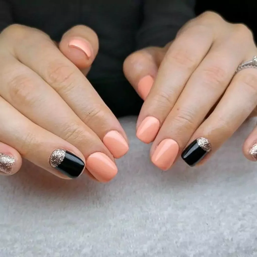 vibrant black and peach nail designs