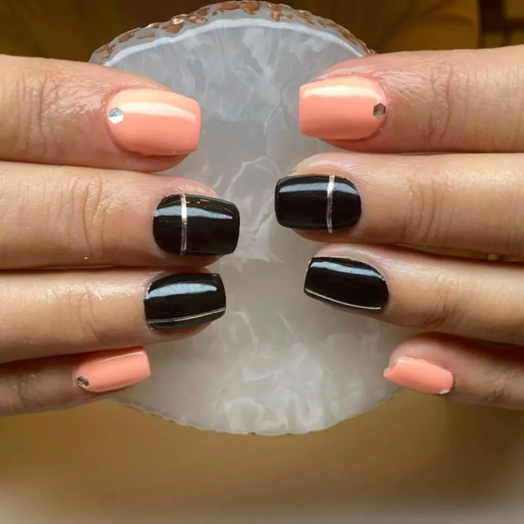 delicate black and peach nail designs