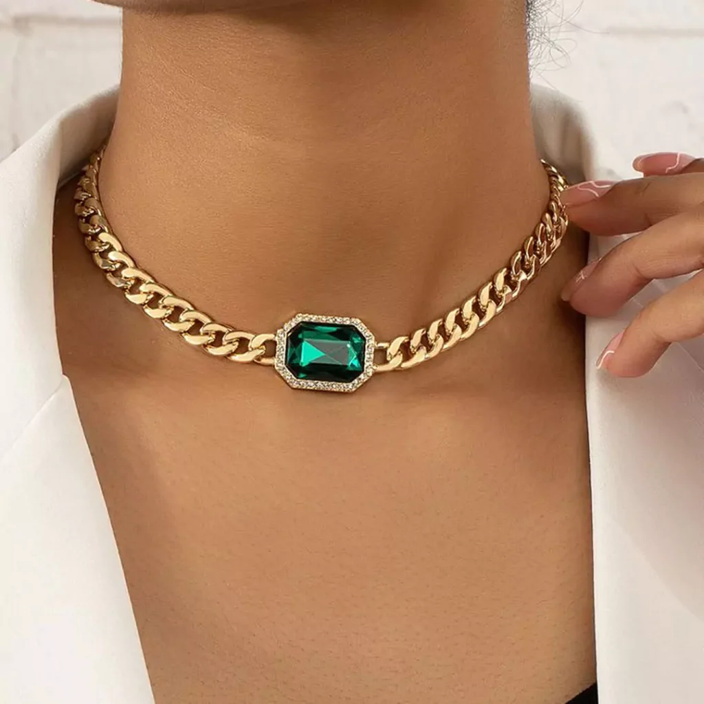 Deceptive necklaces with green gems