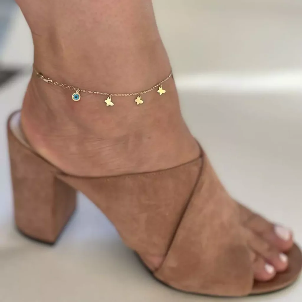 delicate gold butterfly-shaped anklets