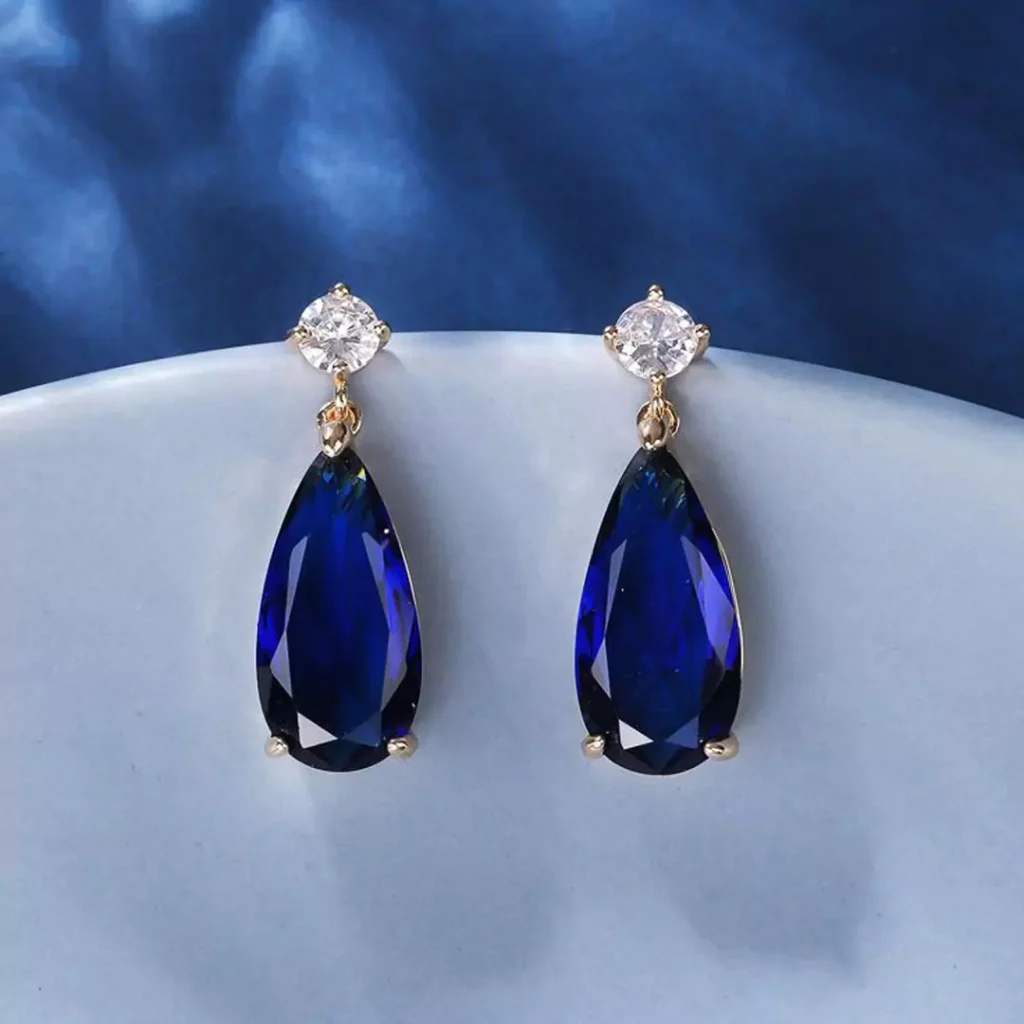 Attractive earring models with blue gems