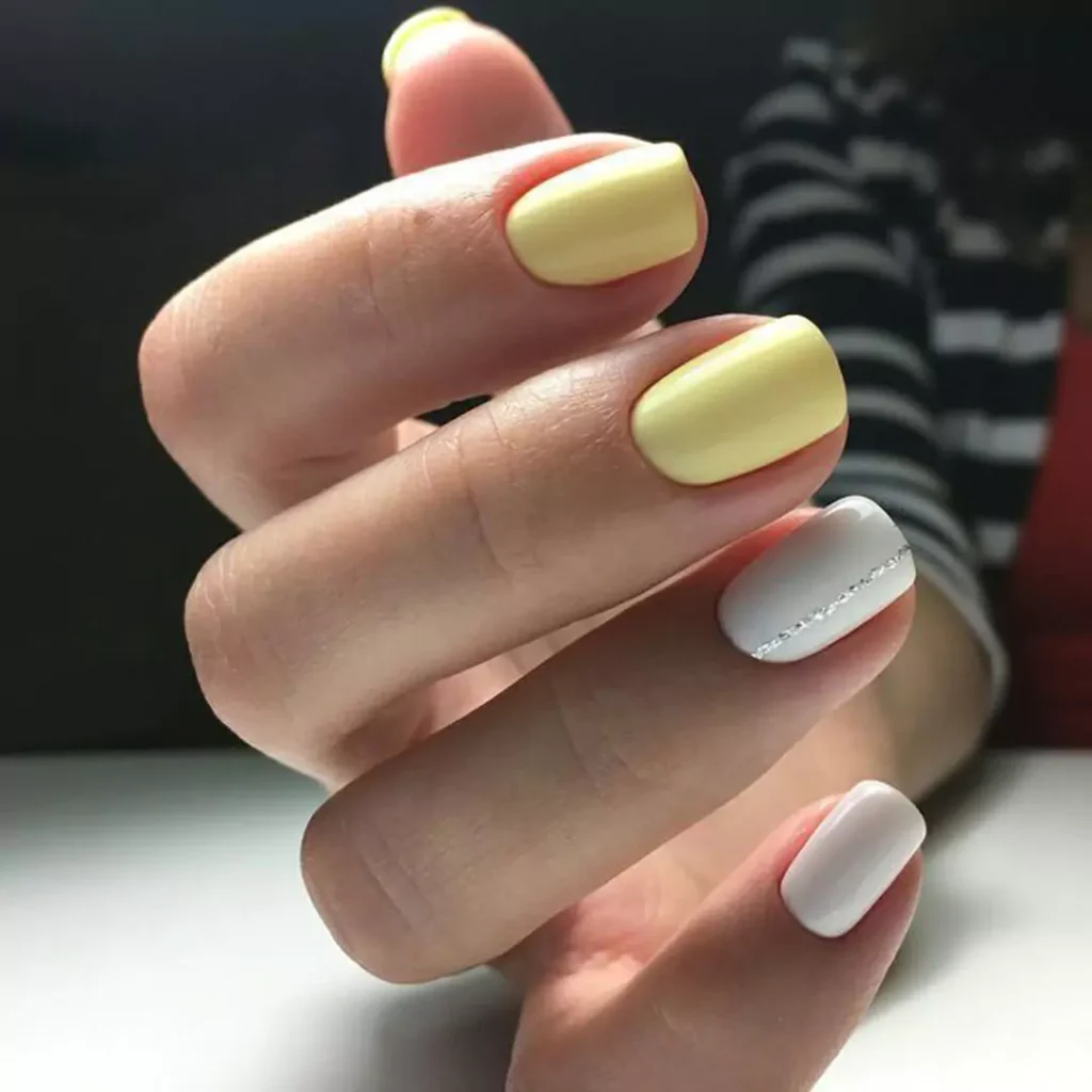 opulent yellow and white nail designs