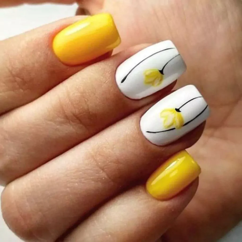 trendy yellow and white nail designs