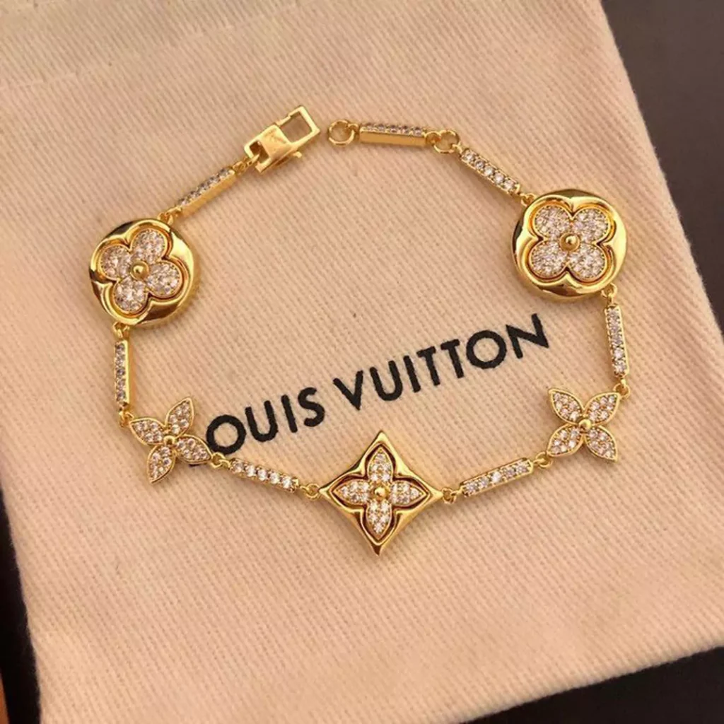 ornate  LV gold bracelets 