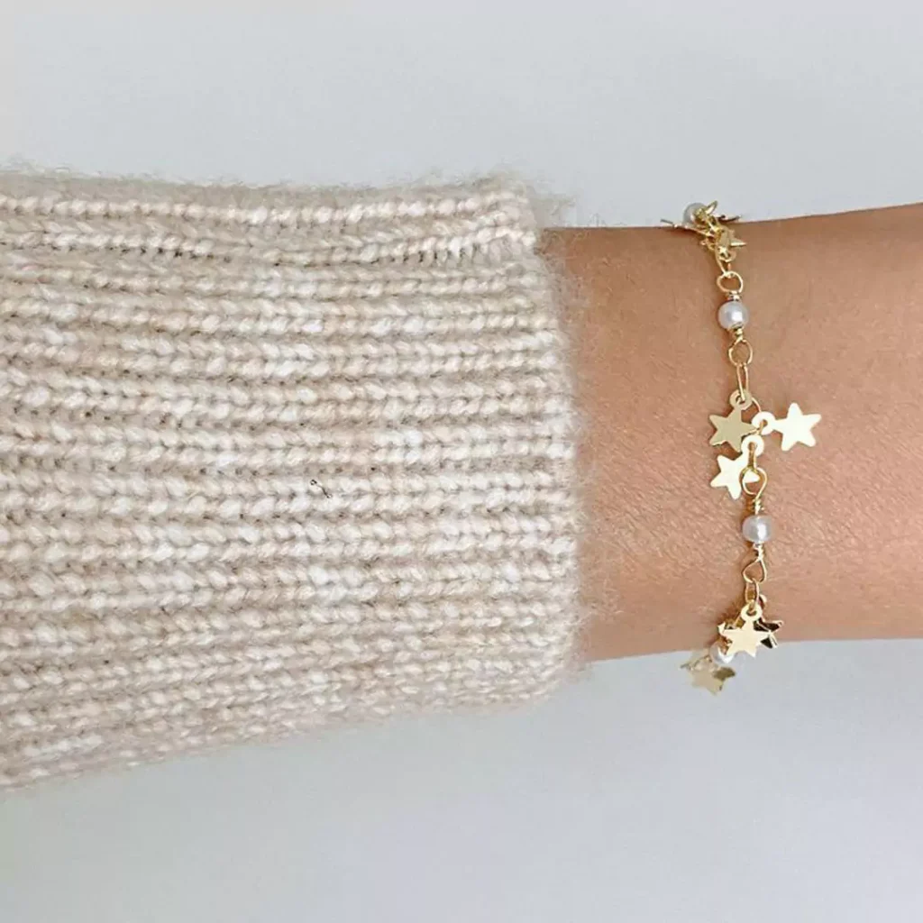 opulent gold bracelets with star designs for women 