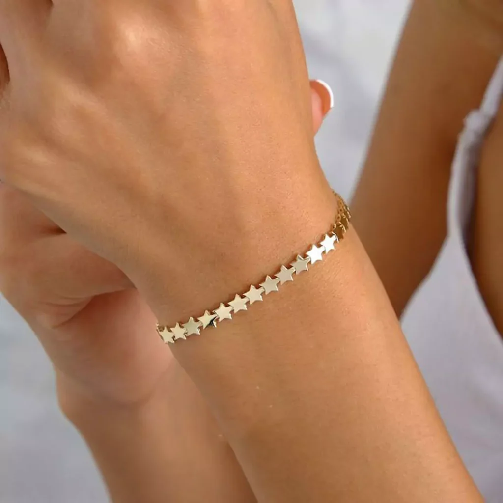 stylish gold bracelets with star designs for women 