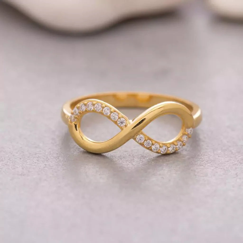 gleaming gold infinity symbol rings 