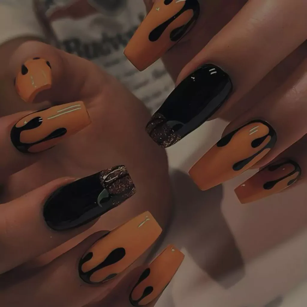 sophisticated black and orange nail designs 