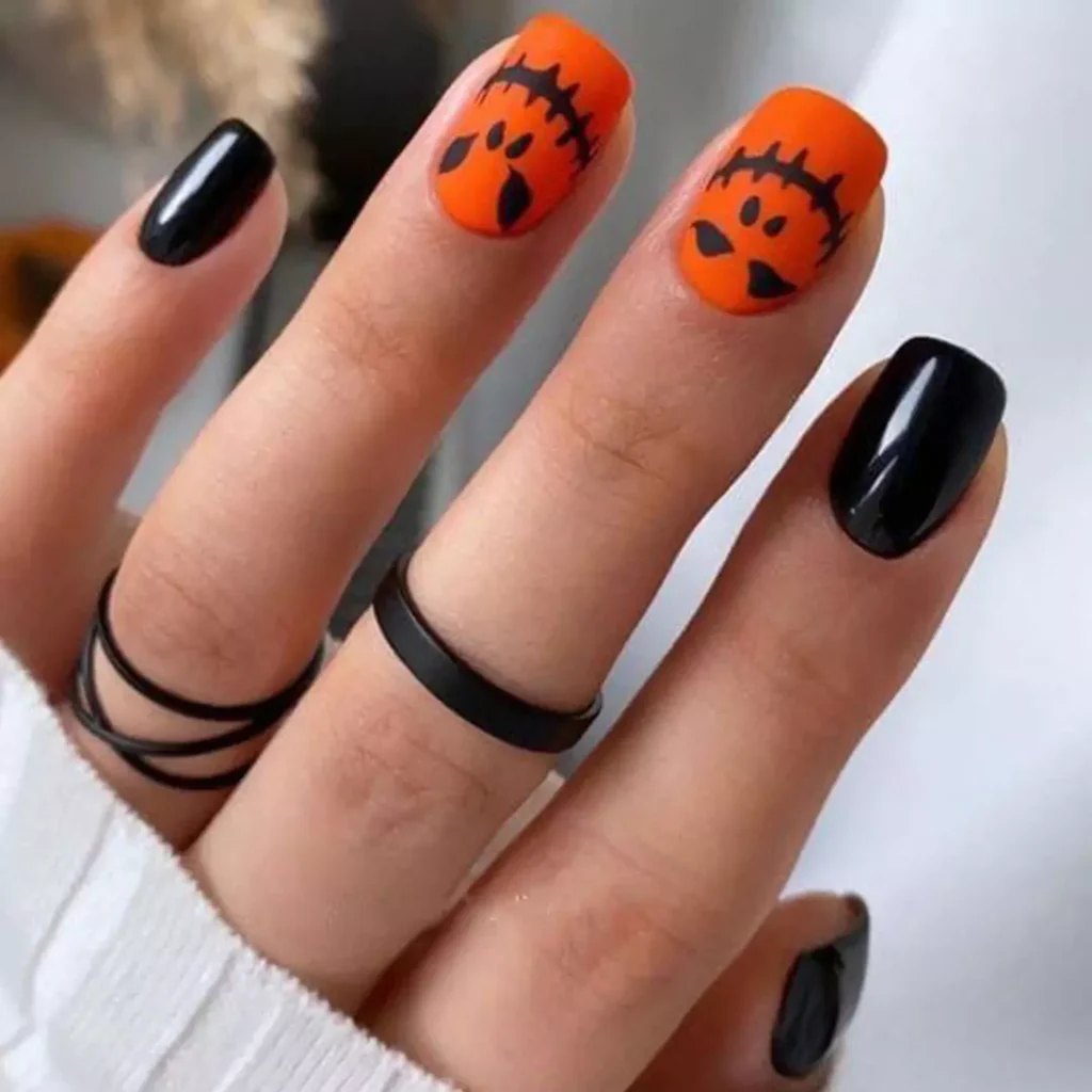 chic black and orange nail designs 