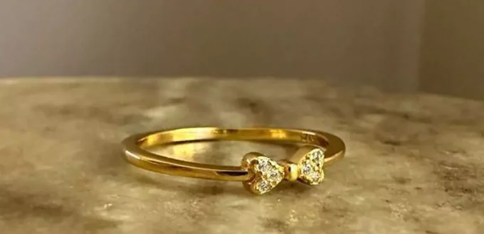 sophisticated gold bow tie rings