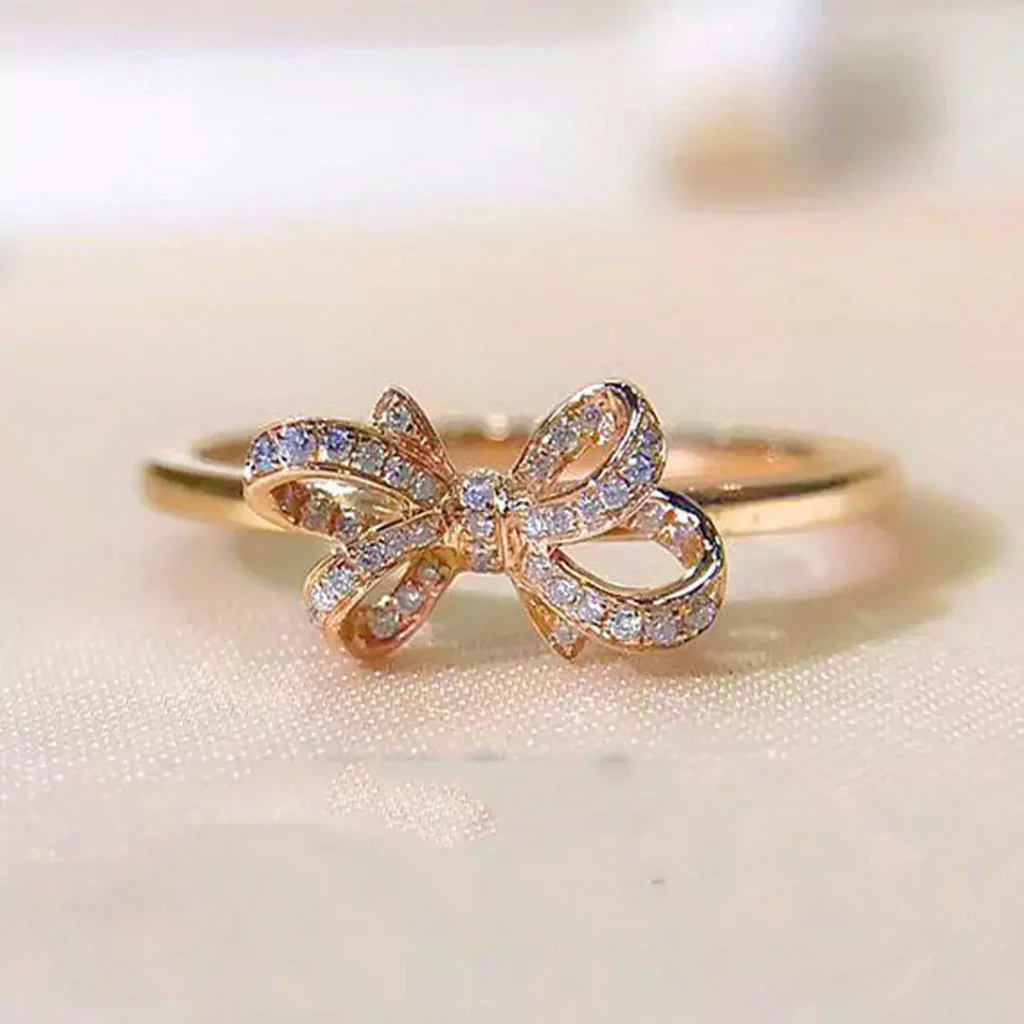 magnificent gold bow tie rings