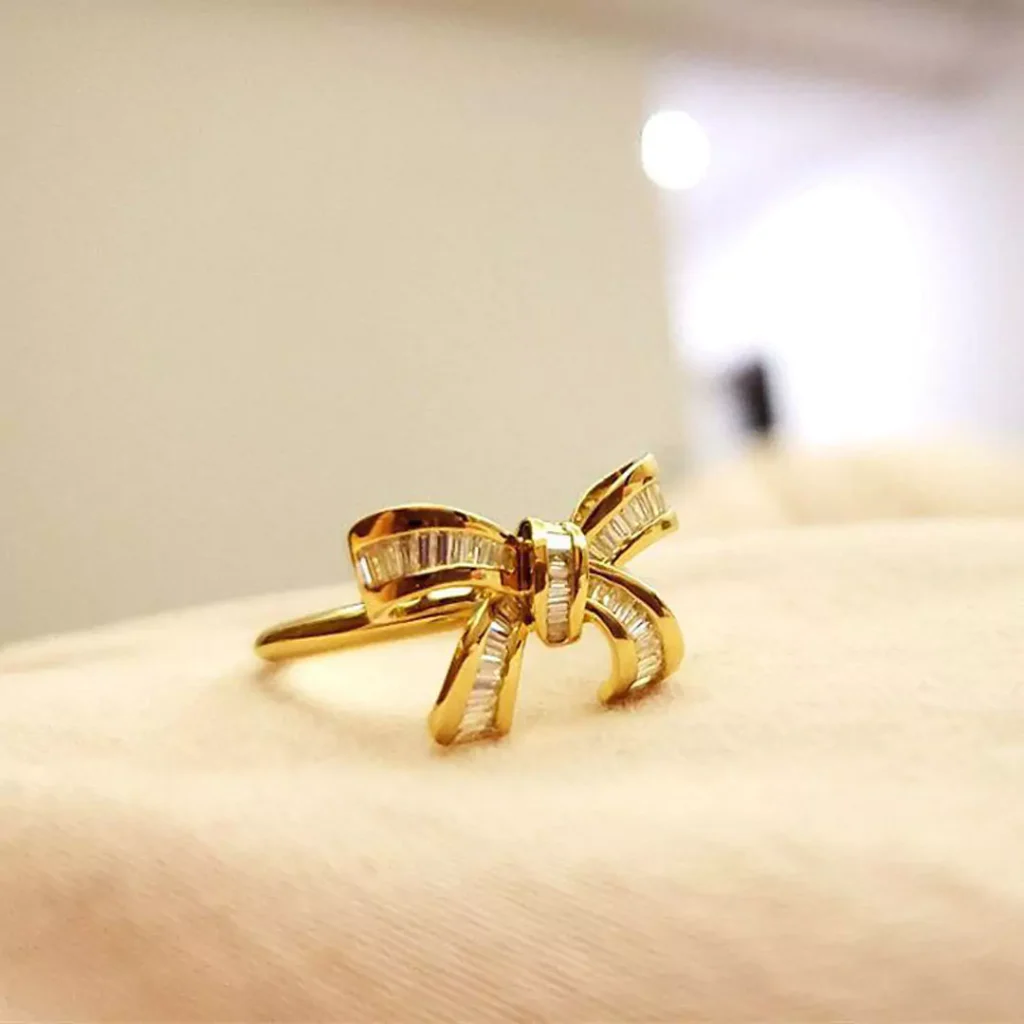 glamorous gold bow tie rings