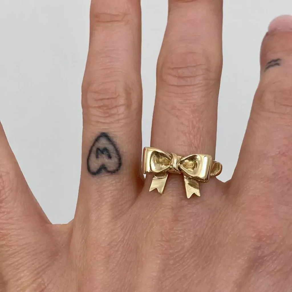 refine gold bow tie rings