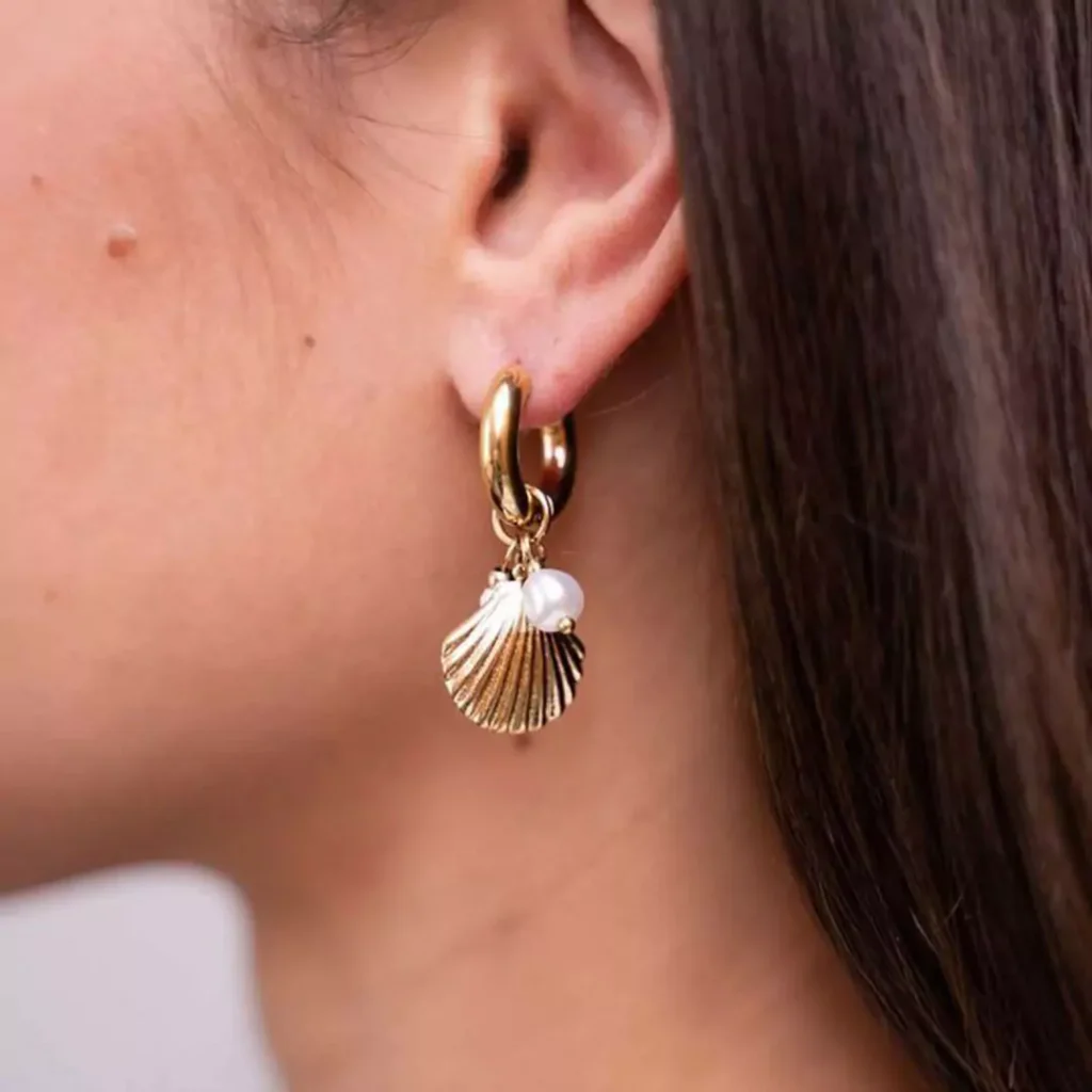 magnificent gold shell hoop earrings