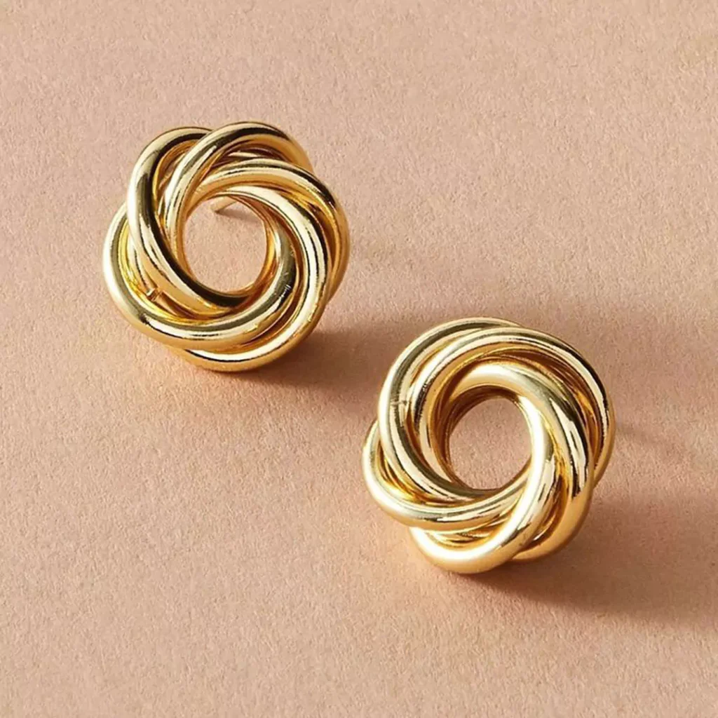 ornate gold simple studs earrings