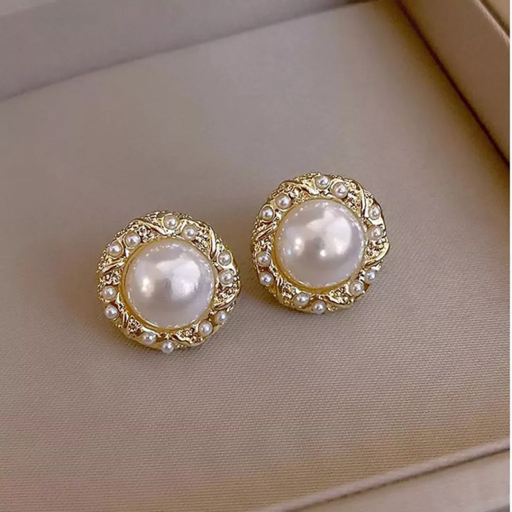 opulent pearl gold stud earrings