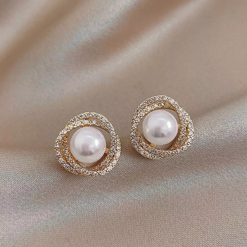 sophisticated pearl gold stud earrings